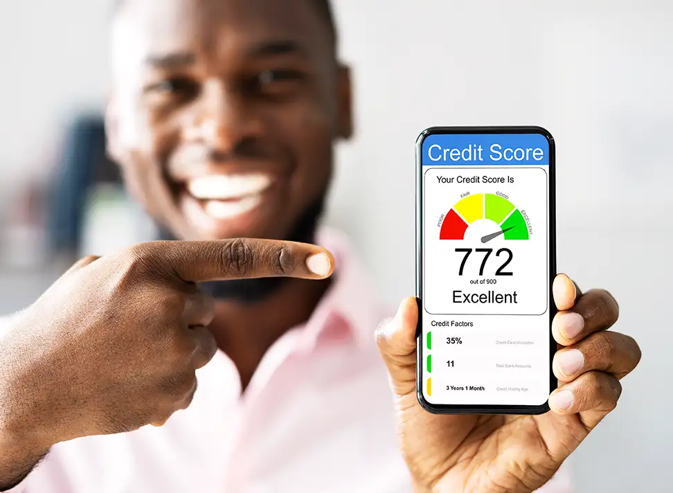 Smiling Man Holding Phone Showing Credit Score