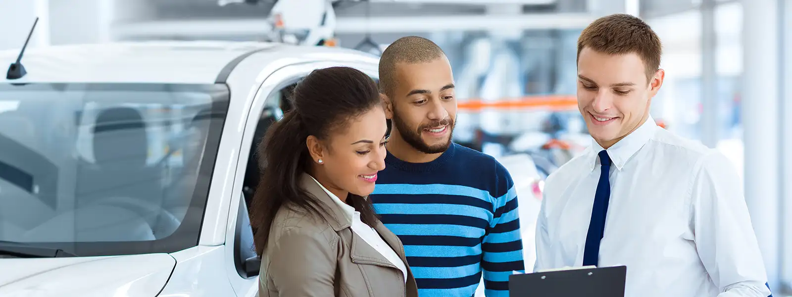 Happy Couple Buying a Car