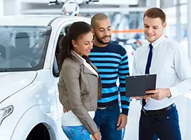 Happy Couple Buying a Car