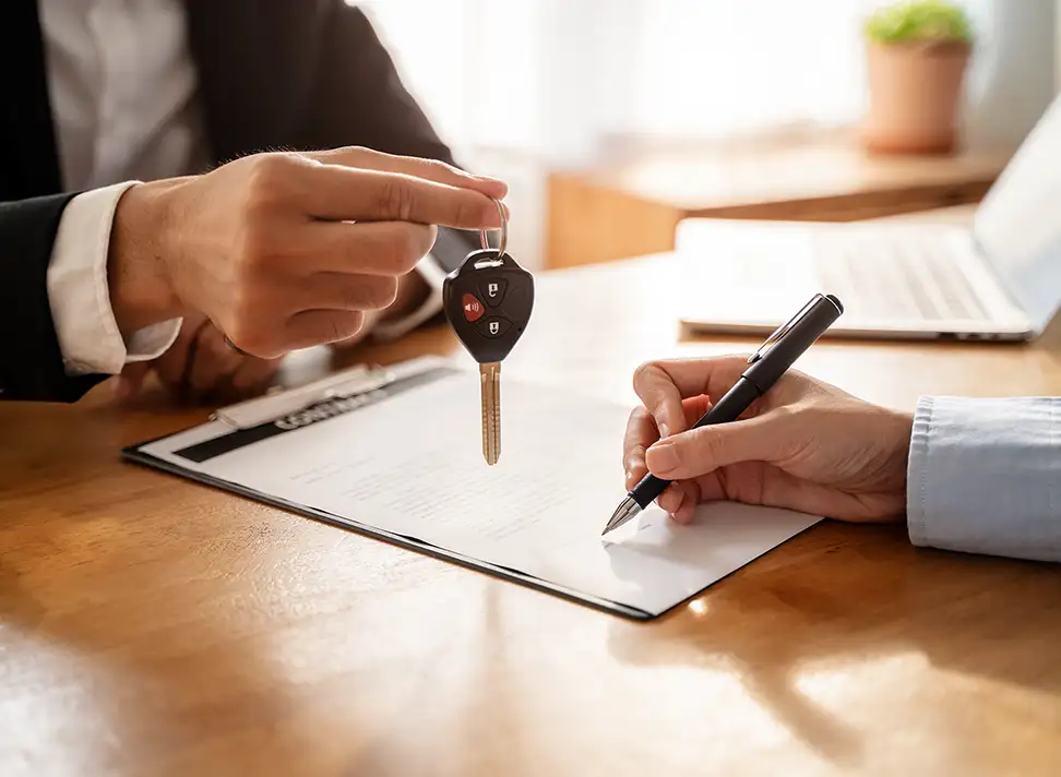 Signing a Car Loan Contract